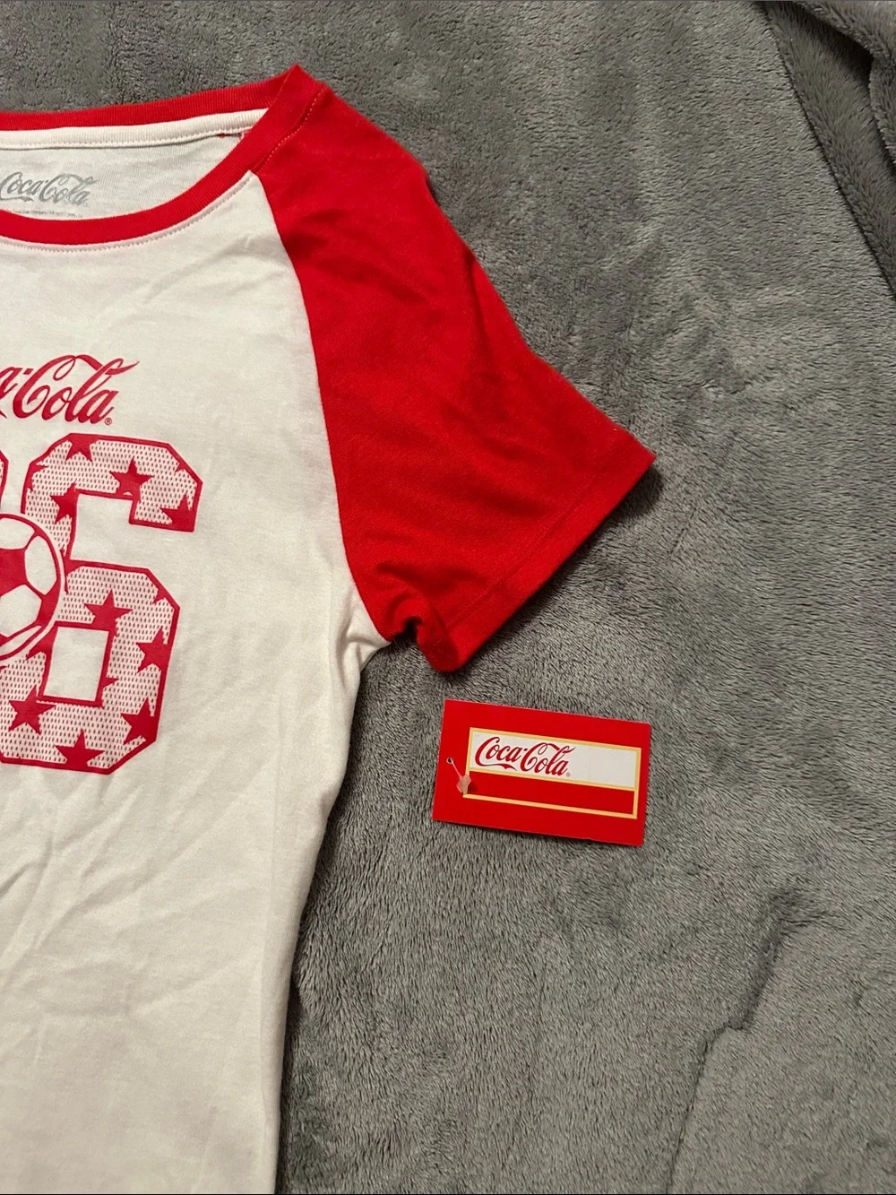 Coca Cola White Tee with Red Raglan Sleeves and Soccer Graphic size L kids